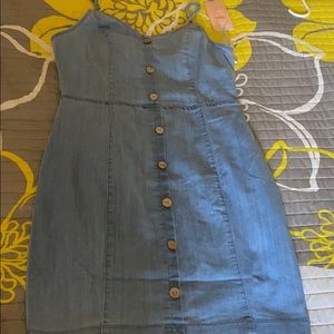 Dress denim material it’s stretch XL